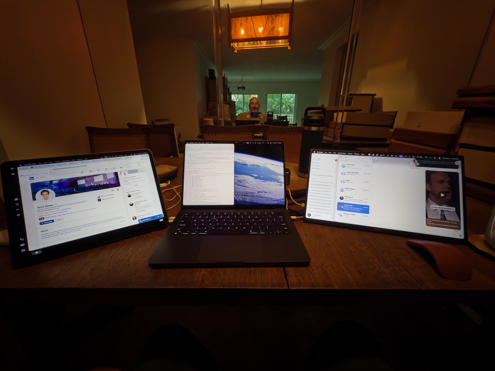Workspace with laptop and tablets used for AI workflow consulting